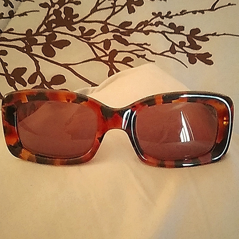 Gucci  tortoise sunglasses